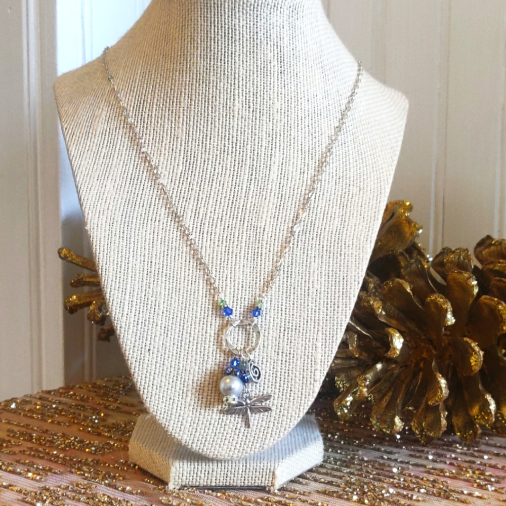 Silver charm necklace.